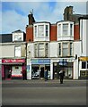 NS2059 : Shops on Main Street, Largs by Richard Sutcliffe