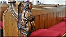 TM0458 : Stowmarket, St. Peter and St. Mary's Church: Bench end 5 by Michael Garlick