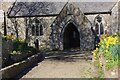 SW5531 : Path to porch of St. Hilary church by Elizabeth Scott