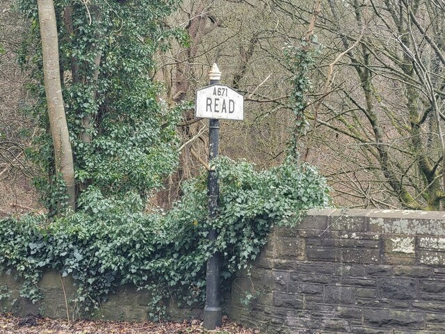 Village Signpost on the A671 Whalley Road on Read New Bridge