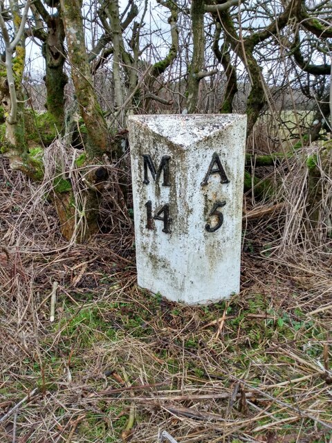 Old Milestone by road (was A1), opposite Sunnyside