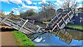 TQ1383 : Collapsed footbridge by Mark Percy