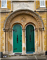 Rushey Green : central doors and plaque, Thackeray