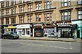 NS5566 : Shops on Dumbarton Road by Richard Sutcliffe