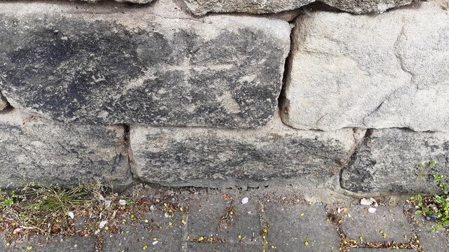 Benchmark(?) on wall of Otley Road opposite #243