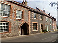 Medieval arch incorporated into houses