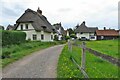 Thatched cottages on the church path