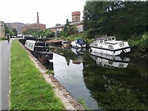 SE2833 : Drained canal, with boats by Stephen Craven