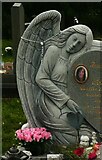 SE1424 : Angel in Brighouse Cemetery by Humphrey Bolton