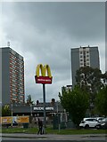 SJ2473 : McDonalds sign and tower blocks, Flint by David Smith