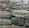 Benchmark cut into roadside wall, Weetwood, Leeds