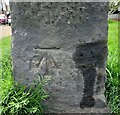 Benchmark cut into lone standing stone post, Lawnswood