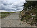 A gate on the gravel track