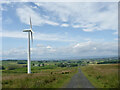 Wind turbine and track above Ardoch