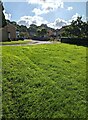 Houses beyond a green, Stonehouse, Gloucestershire