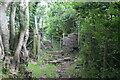 Kissing gate gate at gap in stone wall