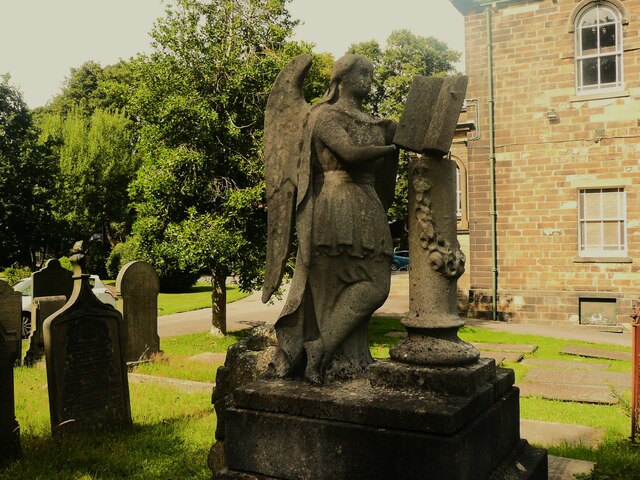 Angel reading on a memorial monument, Lindley