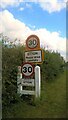 TF1406 : Speed limit signs, Etton by Paul Bryan