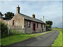 NY2462 : Cottage on the sea front by Kevin Waterhouse