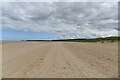 TF8645 : Burnham Overy Staithe: The beach by the sand dunes by Michael Garlick