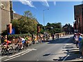 The peloton passing St Peter