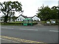 SH4938 : Criccieth Library (New) and bus stop by Gerald England