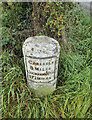 Old Milestone by the A595, west of West Woodside