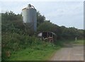 SS8079 : Old silo and railway wagon by a farm east of Sker House by eswales