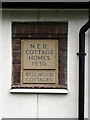 NZ1864 : Plaque, Wedgwood Cottage Homes, Lemington by Andrew Curtis