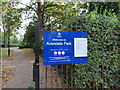 TQ2480 : Avondale Park tennis courts and sign by David Hawgood