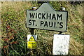 Wickham St Paul village name sign on Church Road