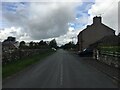 NY6622 : Road through Crackenthorpe by Steven Brown