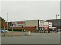 SE3634 : United Carpets and Beds, Crossgates by Stephen Craven