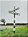 Direction Sign - Signpost at Langrigg Bank