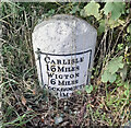 NY2041 : Old Milestone by the A595, east of Aldersceugh by Barbara Todd