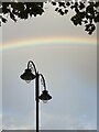 Lamppost and rainbow