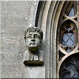 TF2340 : Swineshead, St. Mary's Church: South chancel window 2 left head stop by Michael Garlick
