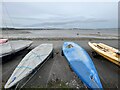 Upturned canoes by Swansea Bay