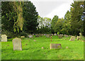 TL7041 : Birdbrook: the west end of the churchyard by John Sutton