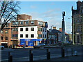 Betting shop and war memorial, New Barnet