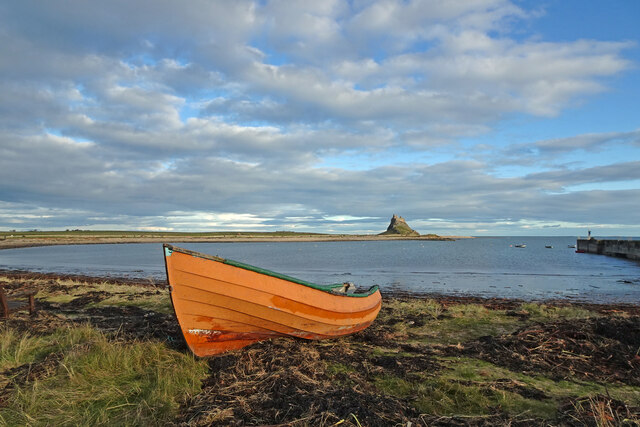 Red Boat and Lindisfarne Castle