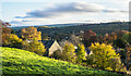 Church surrounded by autumnal foliage