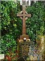 SE0237 : A beautifully carved wooden cross in Haworth Cemetery by Humphrey Bolton