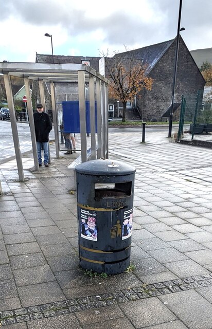Notices on a litter bin in Brynmawr Bus Station