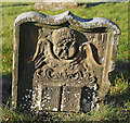 A symbolic gravestone at Morebattle Parish Churchyard