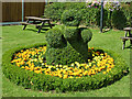SJ7725 : Flower bed at The Anchor near High Offley in Staffordshire by Roger  D Kidd