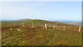 H6898 : Summit of Mullaghaneany - boundary fences & view towards Meenard Mountain by Colin Park