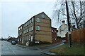 SP9875 : Small block of flats on Denford Road, Ringstead by David Howard