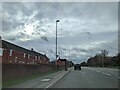 Bus stop and houses on the A430 heading south