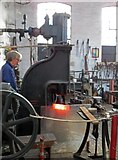 SK2625 : Claymills Victorian Pumping Station - steam hammer in use by Chris Allen